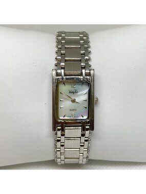 Vanity fair silver tone women’s watch 18mm quartz analog mop dial , running
